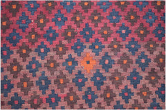Handmade Afghan Maimana kilim rug featuring a repeating geometric pattern in red, blue, and orange.