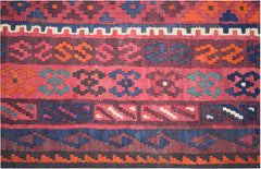 Handmade Afghan Maimana kilim rug featuring geometric patterns in red, blue, and orange wool.