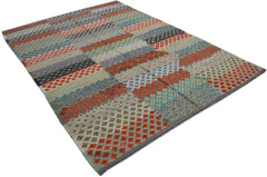 Handwoven Afghan Maimana kilim rug featuring a geometric pattern in orange, blue, and grey tones.