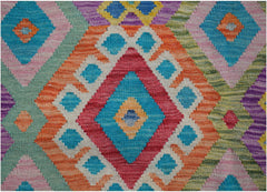 Handwoven Afghan Maimana kilim rug featuring a vibrant geometric diamond pattern in wool.