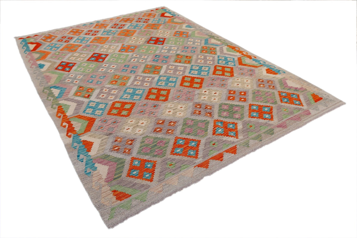 A rectangular Afghan Maimana kilim rug featuring a colorful geometric pattern on a grey background.