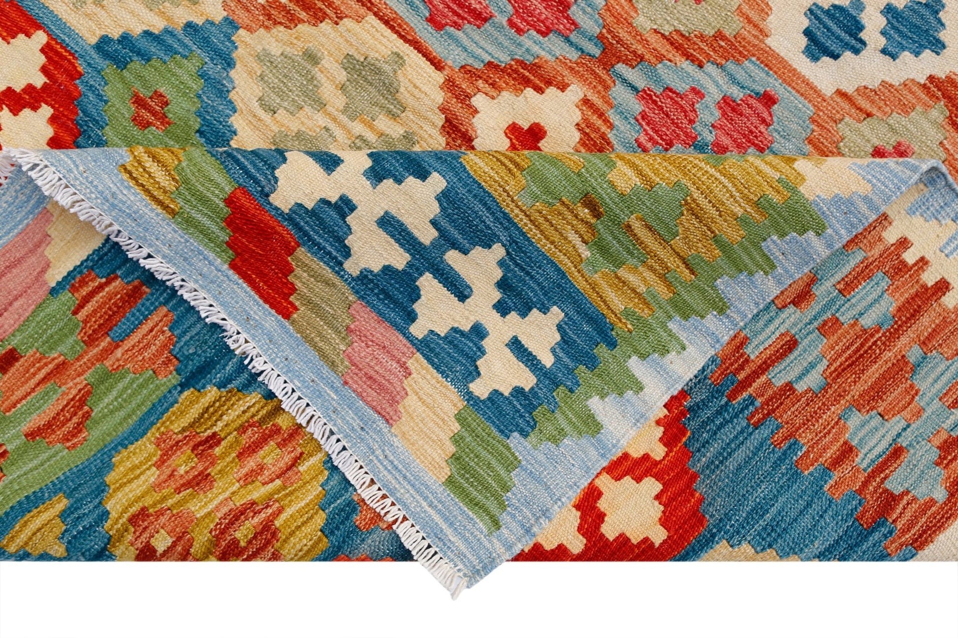 A handmade Afghan Maimana kilim rug featuring a vibrant geometric pattern in wool.