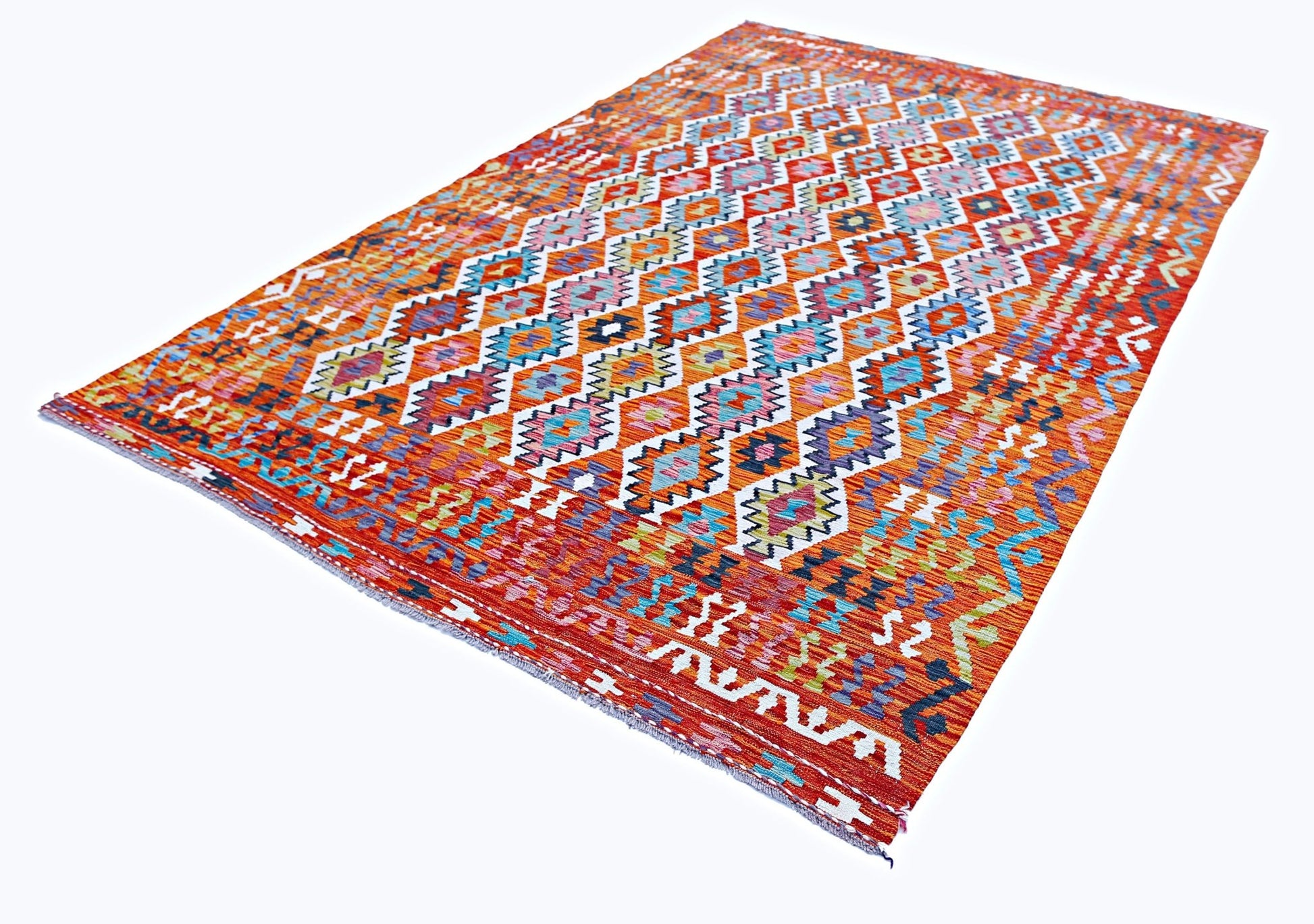 A rectangular Afghan Maimana kilim rug featuring a vibrant geometric pattern in wool.