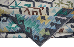 A handwoven Afghan Maimana kilim rug featuring a colorful geometric pattern on a cream background.