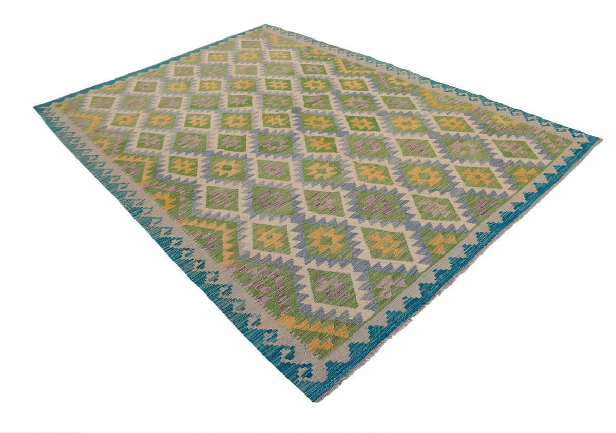 A handmade Afghan Maimana kilim rug featuring a geometric diamond pattern in green, yellow, and blue.