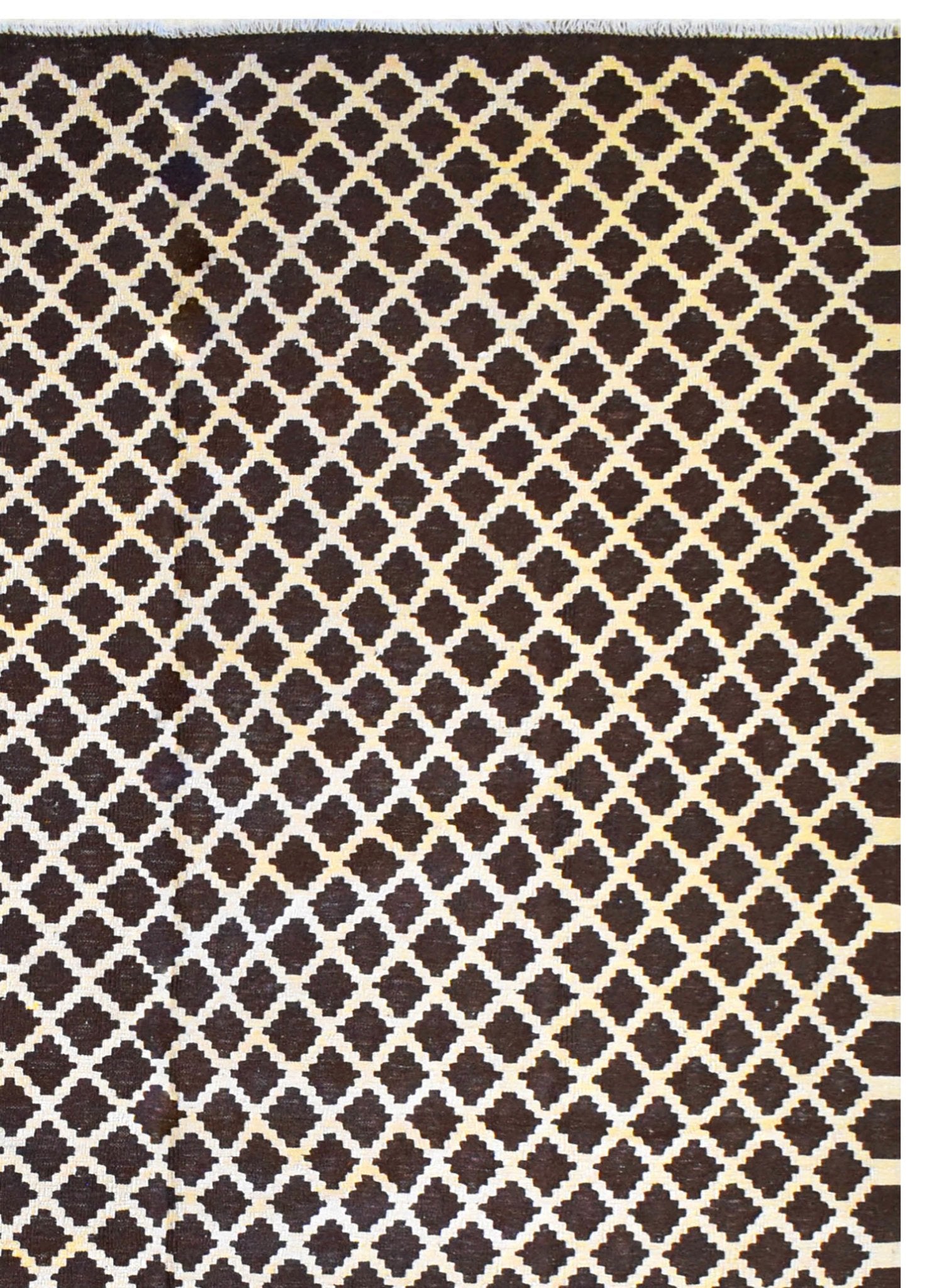 Handmade Afghan Maimana kilim rug featuring a dark brown and cream geometric lattice pattern.