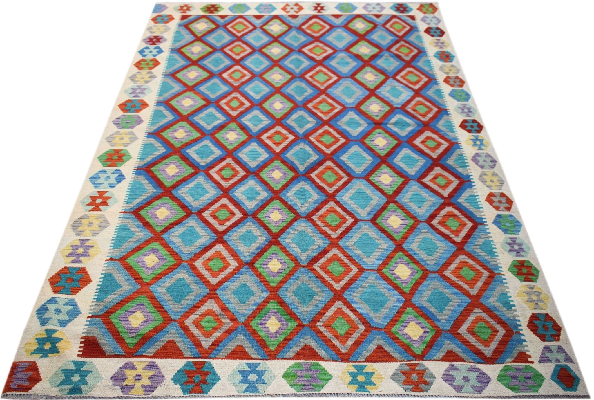 Handwoven Afghan Maimana kilim rug featuring a vibrant geometric diamond pattern in wool.