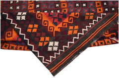 A handwoven Afghan Maimana kilim featuring geometric patterns in orange, red, and dark blue wool.
