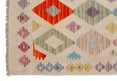 Handwoven Afghan Maimana kilim rug featuring a cream background with colorful geometric patterns.