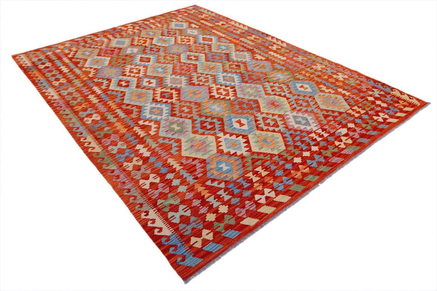 Handwoven Afghan Maimana kilim rug featuring a vibrant red field with geometric diamond patterns.