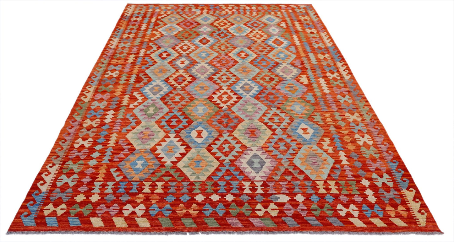 Handwoven Afghan Maimana kilim rug featuring a vibrant orange field with geometric diamond patterns.