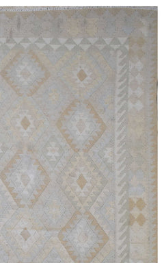 Handmade Afghan Maimana kilim rug featuring a geometric diamond pattern in neutral beige tones.