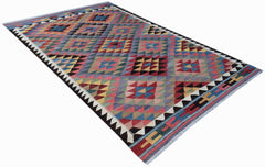 Handwoven Afghan Maimana kilim rug featuring a colorful geometric diamond pattern.