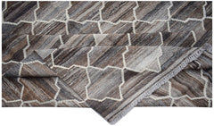 Handwoven Afghan Maimana kilim rug featuring a geometric pattern in shades of brown and grey.