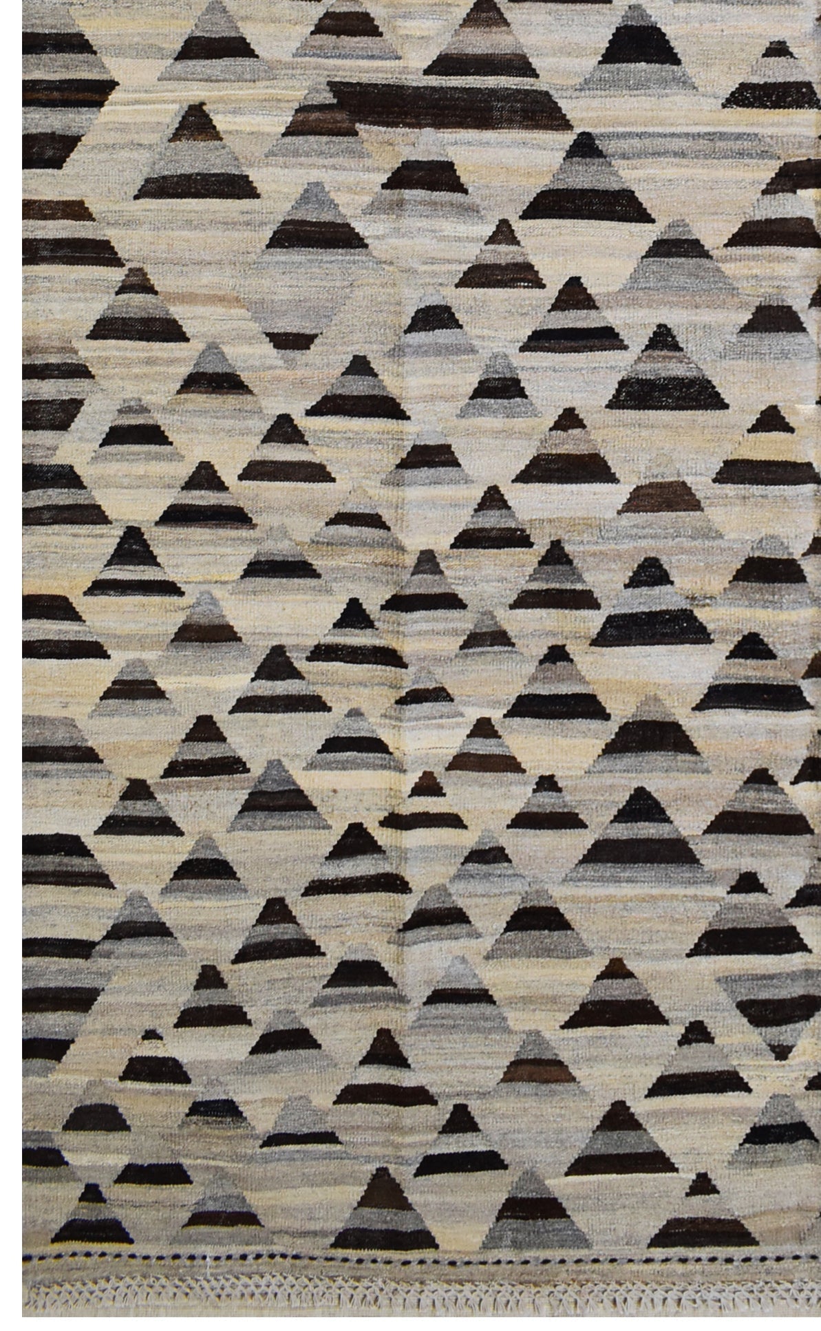 Handmade Afghan Maimana kilim rug featuring a repeating geometric triangle pattern in neutral tones.