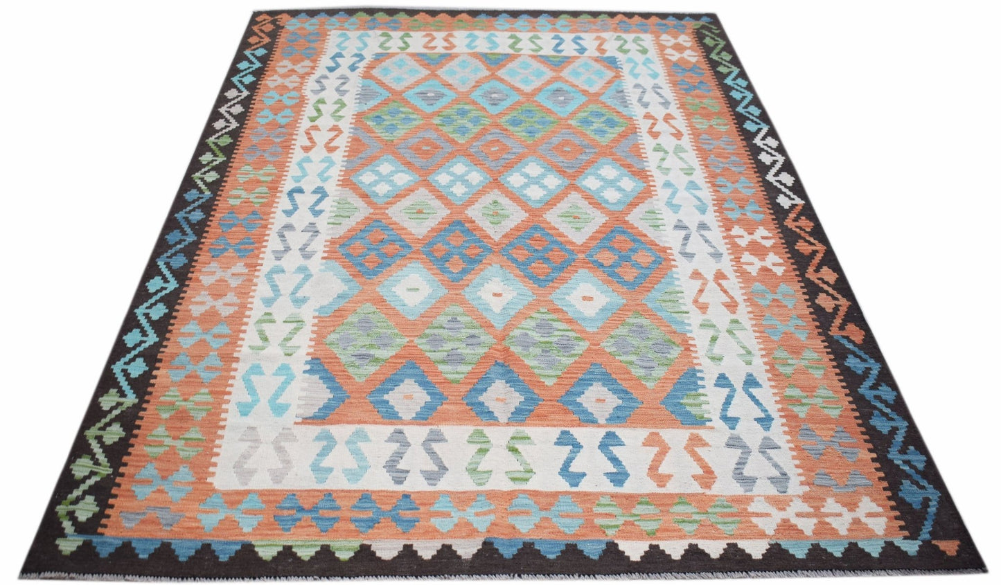 Handwoven Afghan Maimana kilim rug featuring a geometric diamond pattern in blue, orange, and green.