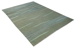 A handmade Afghan Maimana kilim rug featuring a flatweave texture and abstract green patterns.