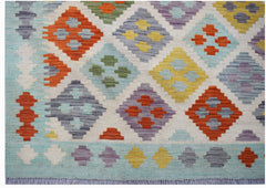 Handmade Afghan Maimana kilim rug featuring a colorful geometric diamond pattern on a wool base.