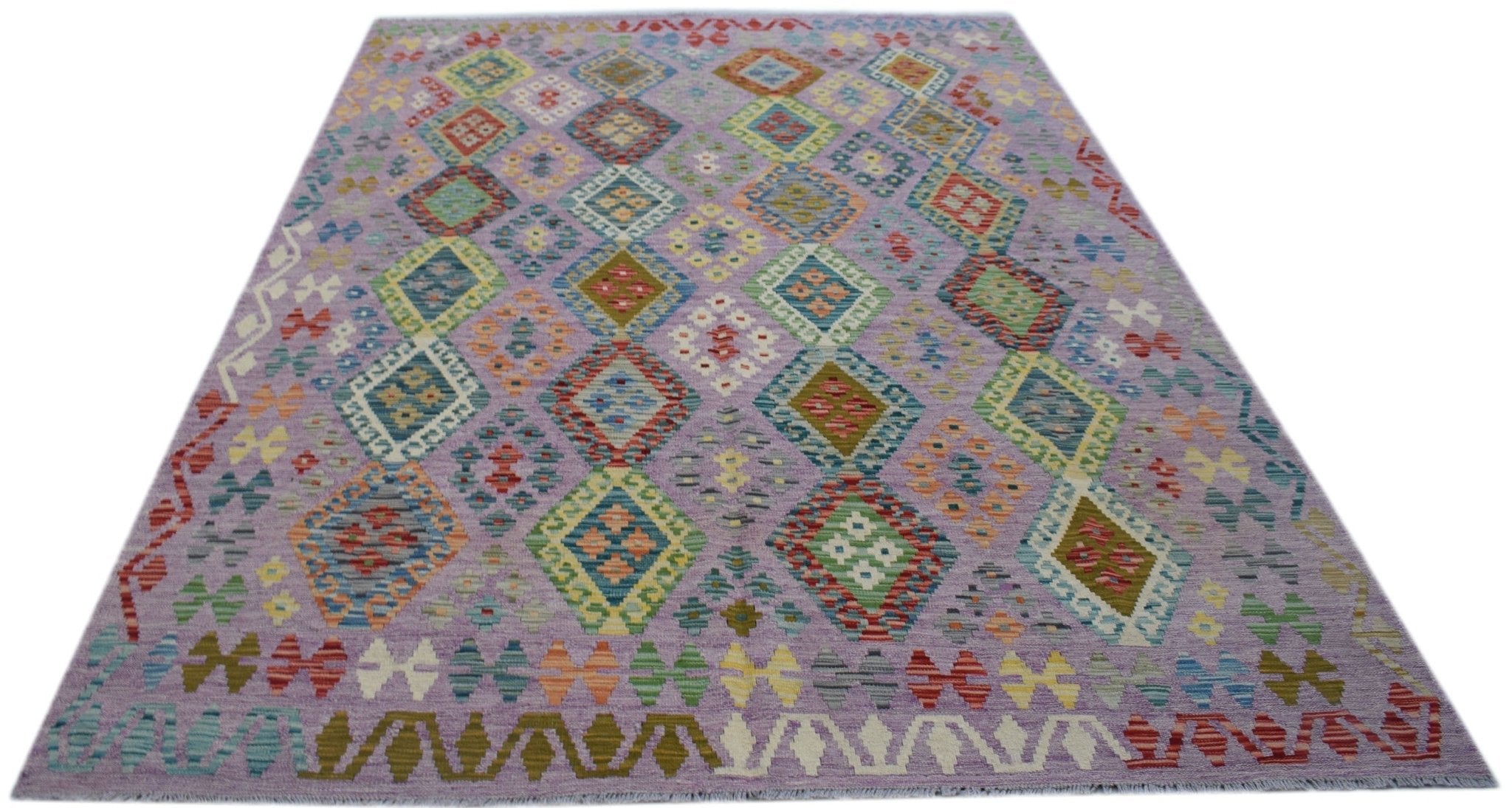 Handwoven Afghan Maimana kilim rug featuring a lavender field with colorful geometric diamond motifs.