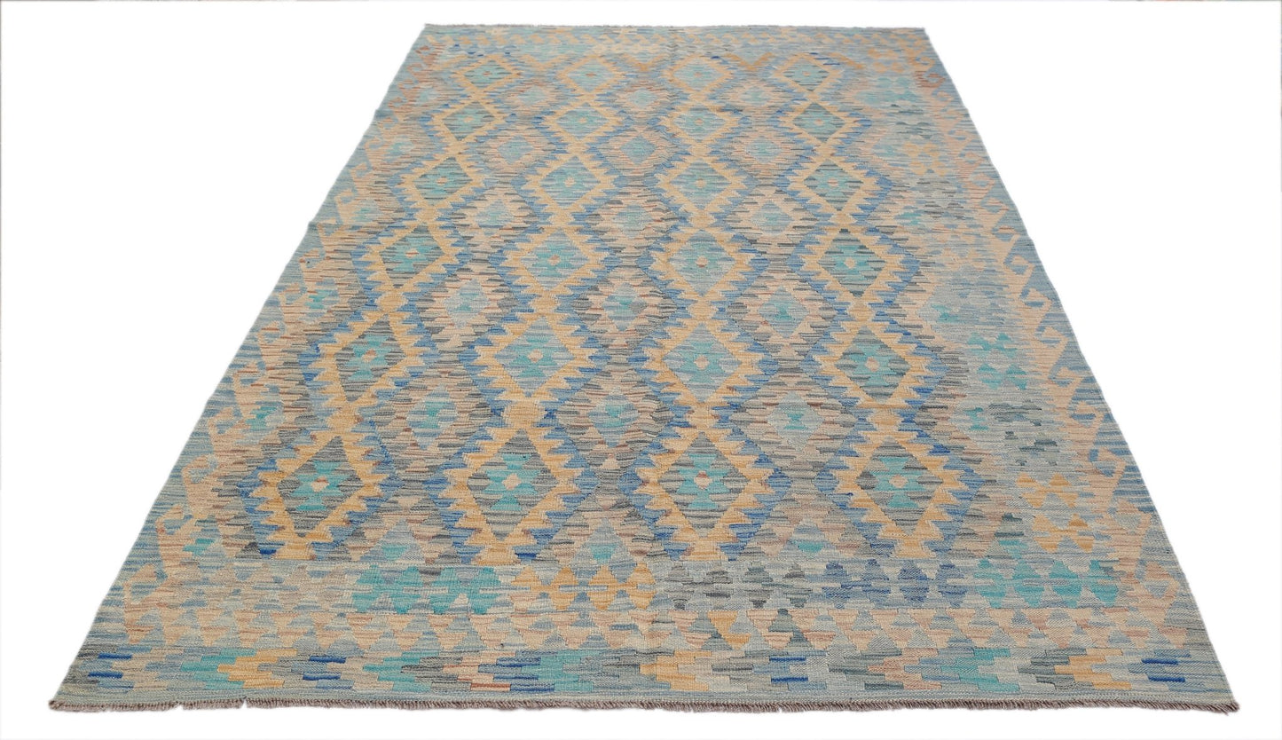 Handwoven Afghan Maimana kilim rug featuring a geometric diamond pattern in blue and tan tones.