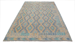 Handwoven Afghan Maimana kilim rug featuring a geometric diamond pattern in blue and tan tones.