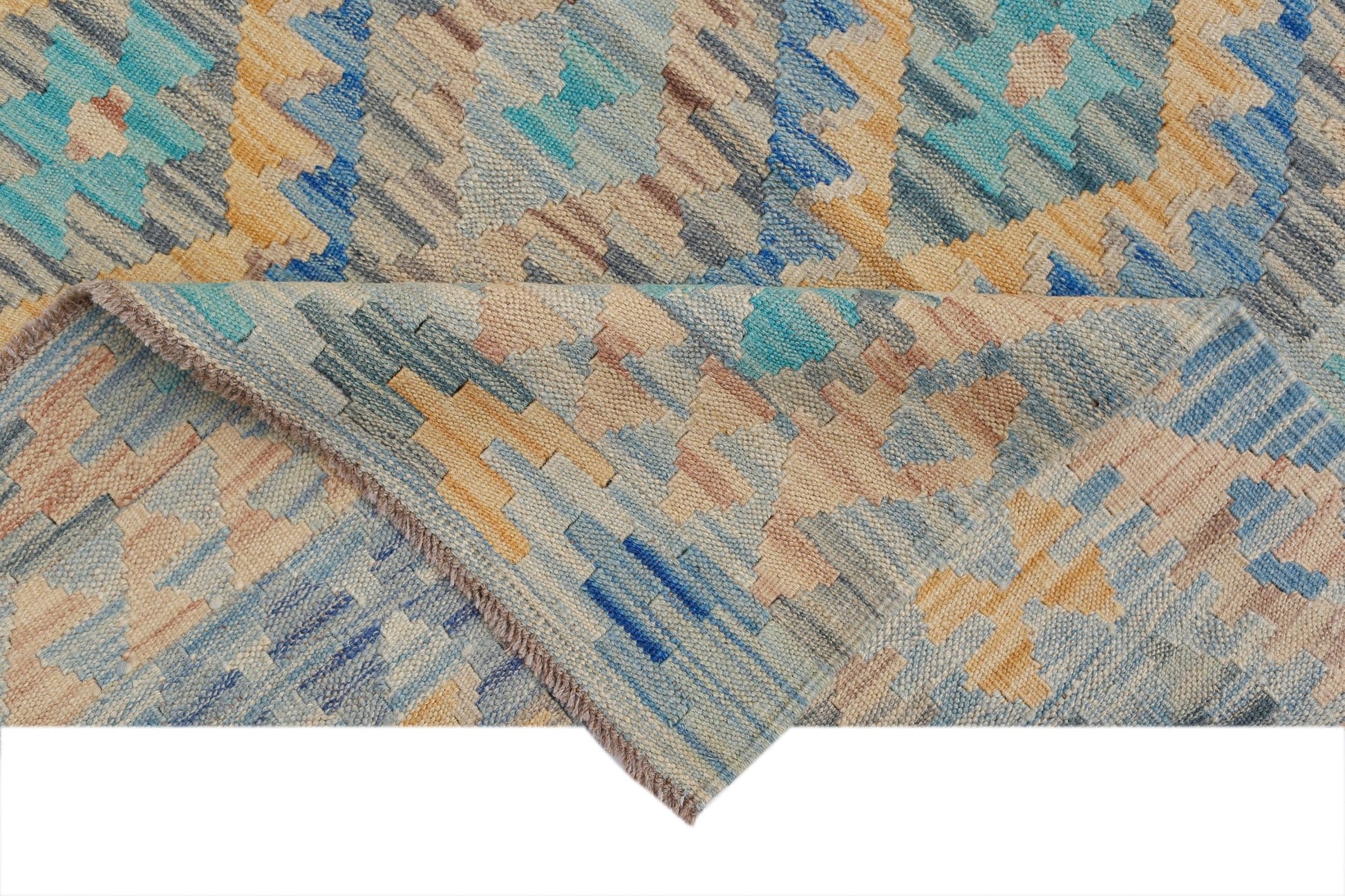A handmade Afghan Maimana kilim rug featuring a geometric pattern in blue, beige, and tan tones.