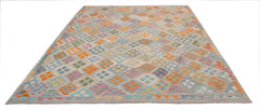 Handwoven Afghan Maimana kilim rug featuring a colorful geometric diamond pattern on a grey base.
