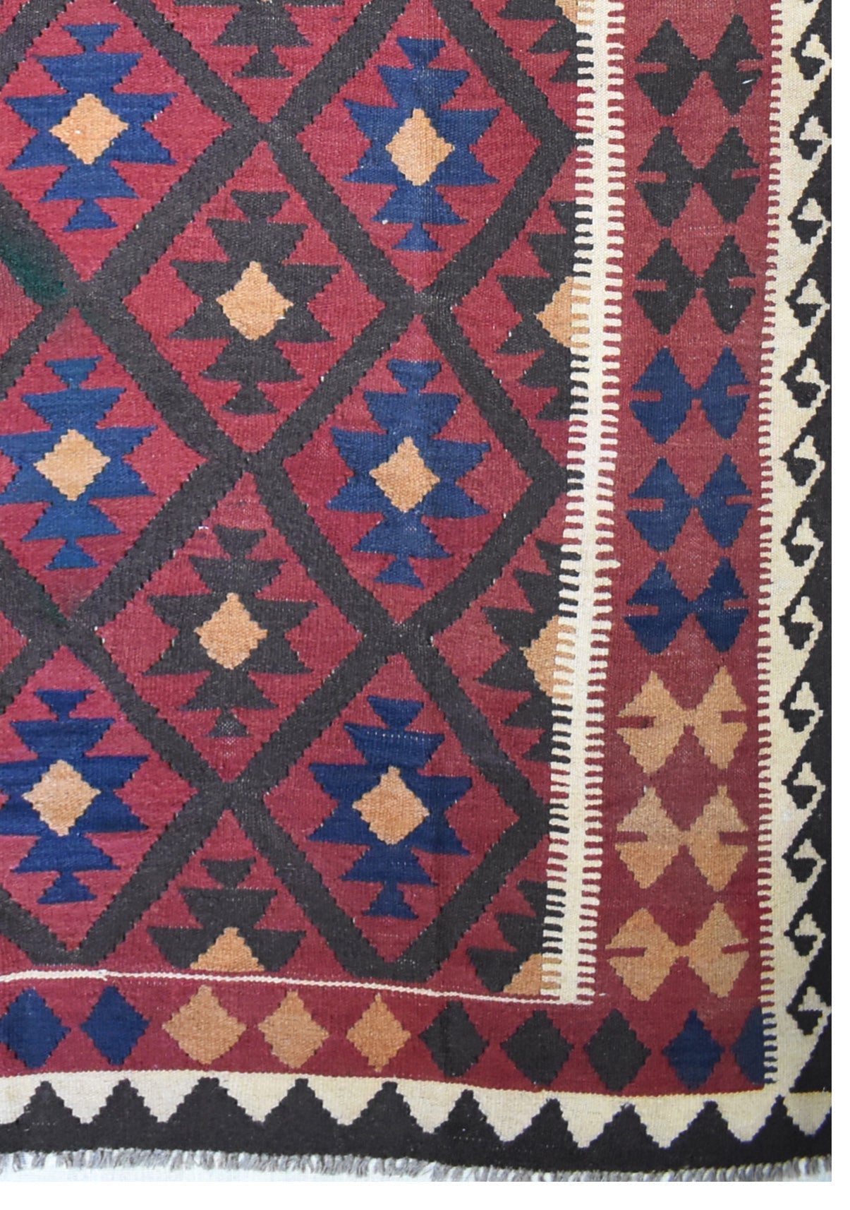Handmade Afghan Maimana kilim rug featuring a geometric diamond pattern in red, blue, and tan.