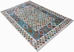 Afghan Maimana Kilim with geometric diamond patterns in blue, orange, and green.