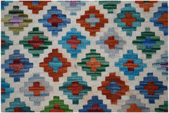 Handwoven Afghan Maimana kilim featuring a repeating geometric diamond pattern in vibrant colors.