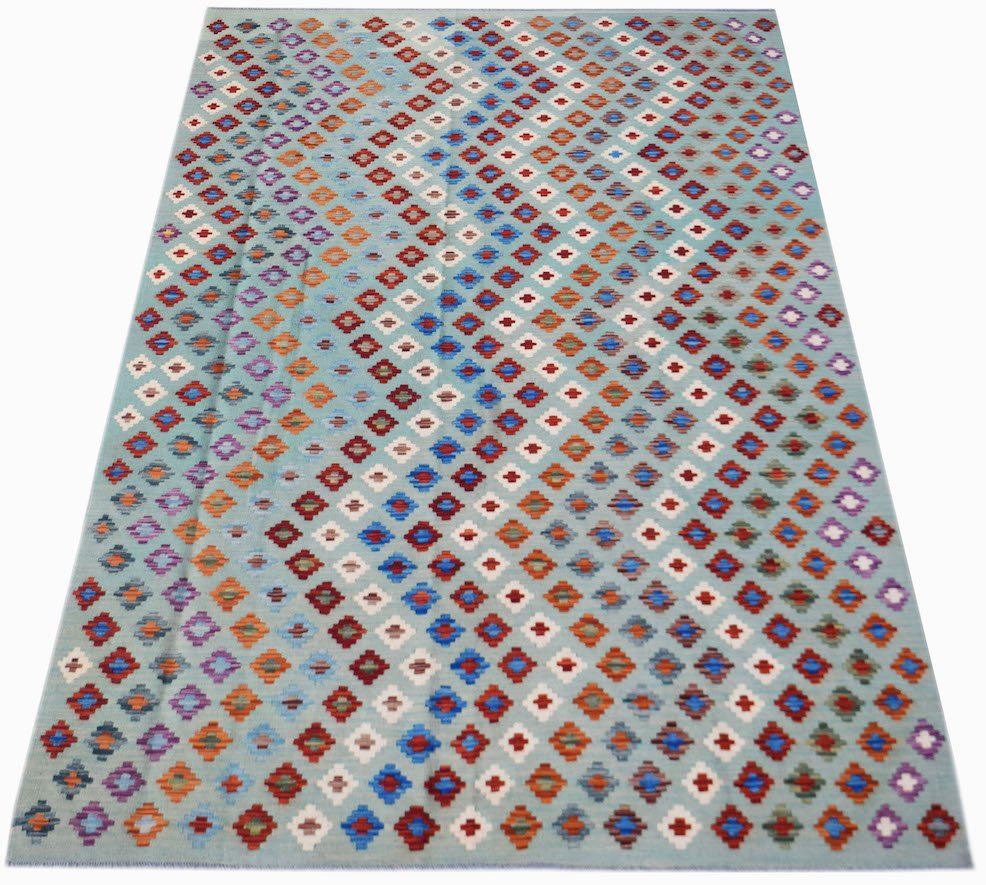 Handwoven Afghan Maimana kilim rug featuring a light blue background with colorful geometric motifs.