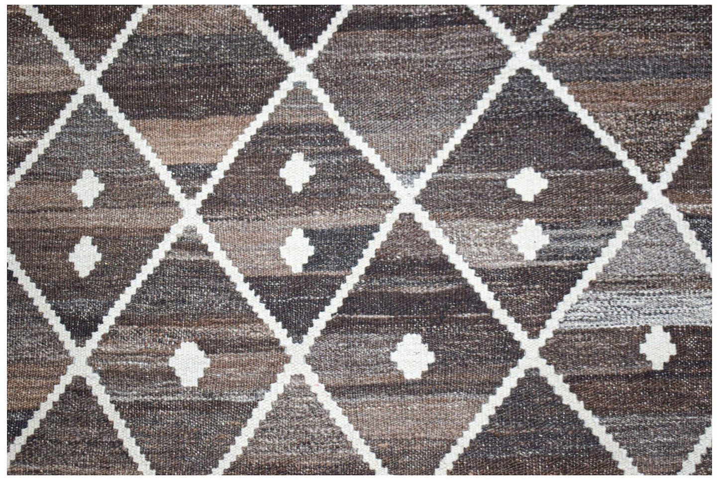 Afghan Maimana Kilim with a diamond pattern in brown and white.