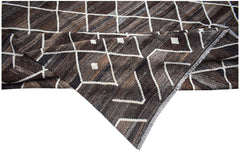 Handwoven Afghan Maimana kilim rug featuring a brown and white geometric diamond pattern.