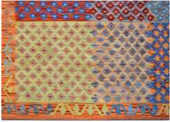 Handwoven Afghan Maimana kilim rug featuring a colorful geometric patchwork pattern in wool.