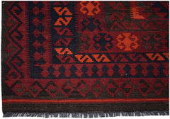 Handwoven Afghan Maimana kilim rug featuring geometric patterns in red, orange, and dark brown.