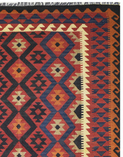 Handmade Afghan Maimana kilim rug featuring a geometric diamond pattern in red, blue, and tan.