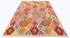 Handmade Afghan Maimana kilim rug featuring a vibrant geometric diamond pattern in wool.
