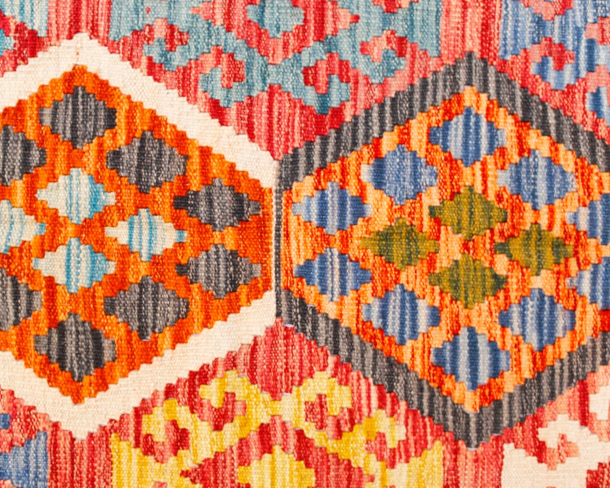 Handwoven Afghan Maimana Kilim featuring a vibrant geometric pattern in wool.