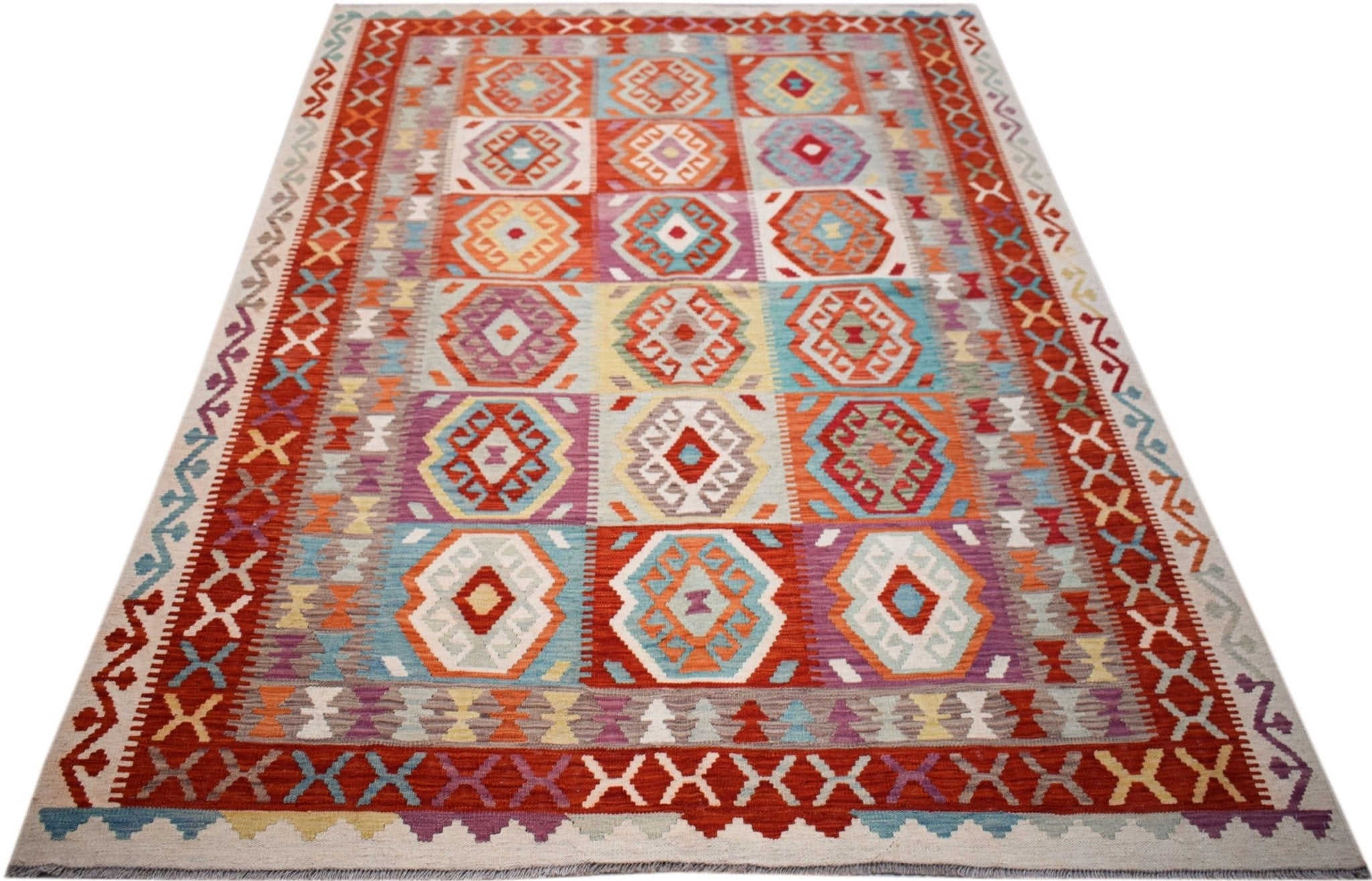 Handwoven Afghan Maimana kilim rug featuring a colorful geometric pattern on a flat wool weave.