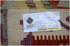 A flatweave Afghan Maimana Kilim featuring a colorful geometric pattern and a fringed edge.
