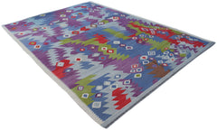 Handmade Afghan Maimana kilim rug featuring a vibrant geometric pattern in wool.