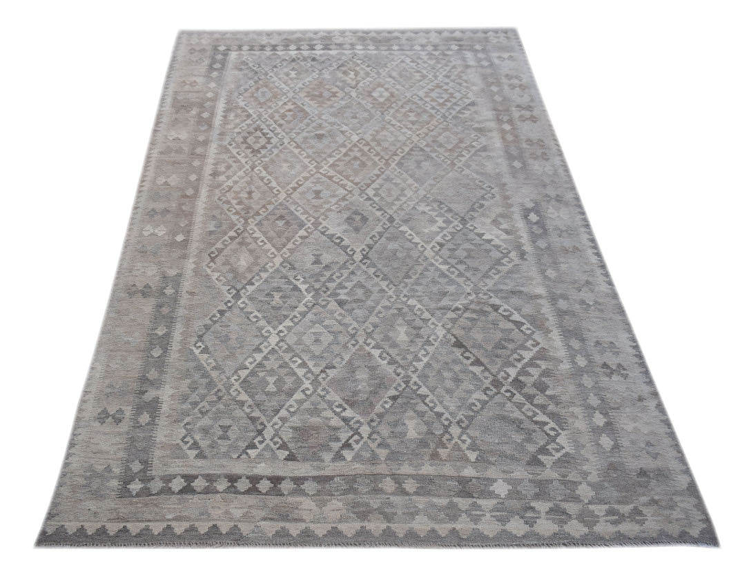 Handwoven Afghan Maiamana kilim rug featuring a grey geometric diamond pattern.