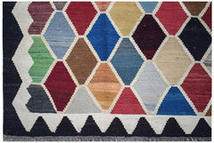 Handwoven Afghan Maimana kilim featuring a colorful diamond pattern and a flat-weave wool texture.