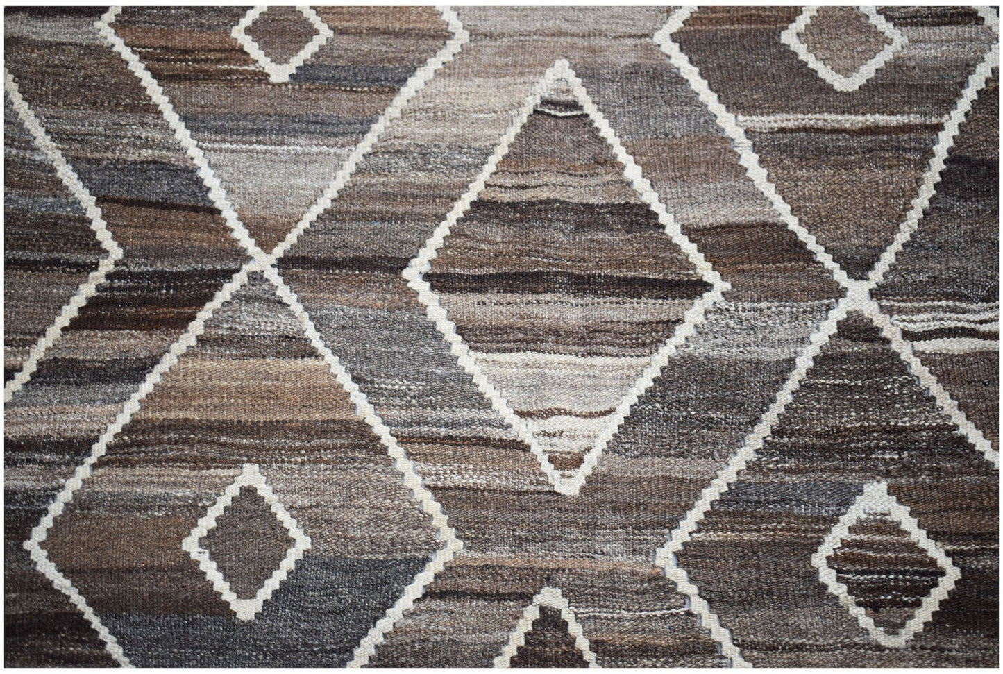 Afghan Maimana Kilim with a diamond pattern in brown and white.