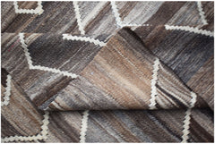Afghan Maimana Kilim with geometric patterns in brown and white.