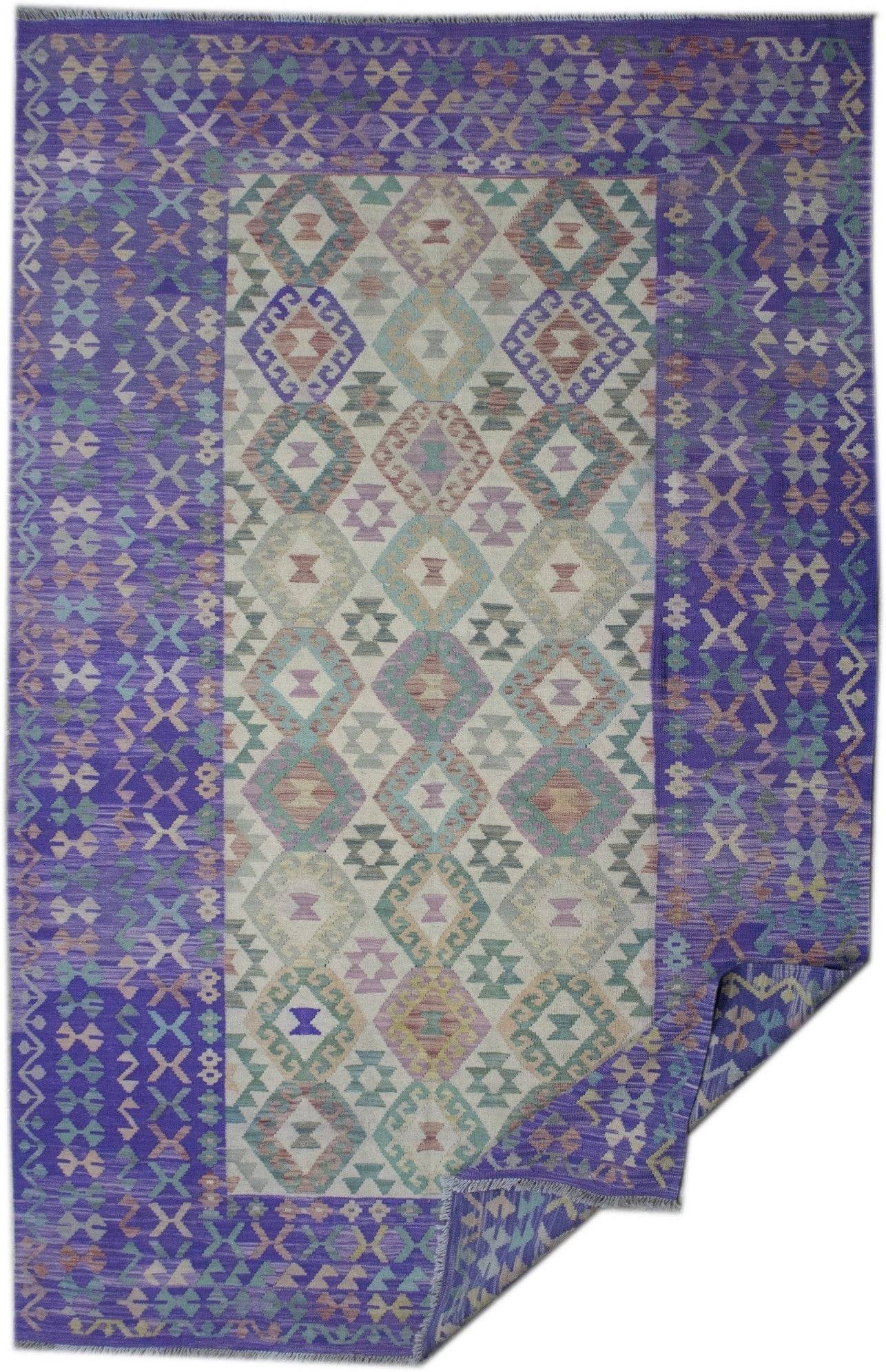 Handmade Afghan Maimana kilim rug featuring a geometric diamond pattern in purple and muted tones.