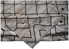 Handwoven Afghan Maimana kilim rug featuring a neutral geometric grid pattern in wool.