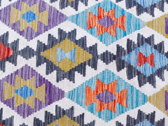 Handwoven Afghan Maimana kilim featuring a repeating geometric diamond pattern in vibrant colors.