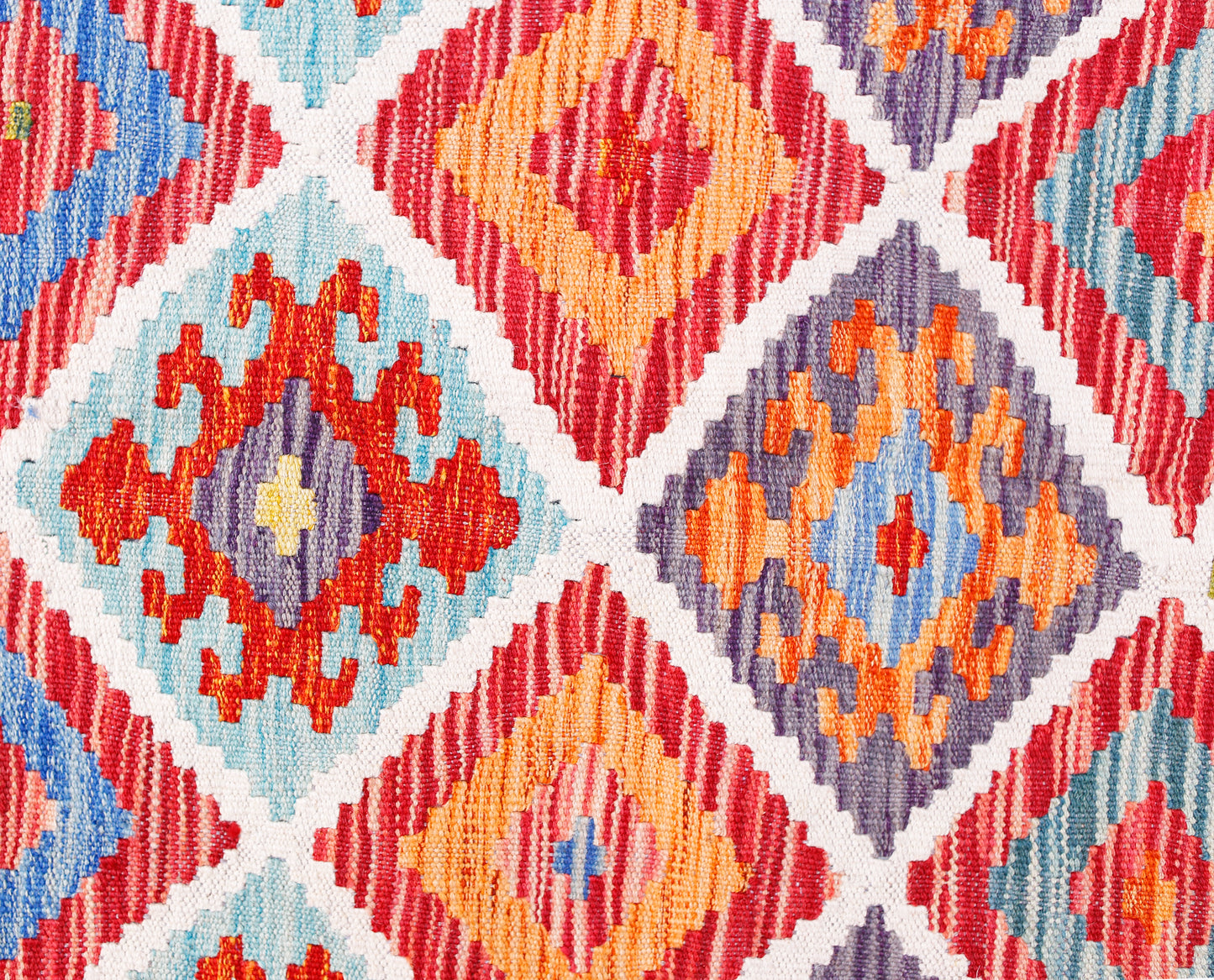 Handwoven Afghan Maimana kilim featuring a vibrant geometric diamond pattern in wool.