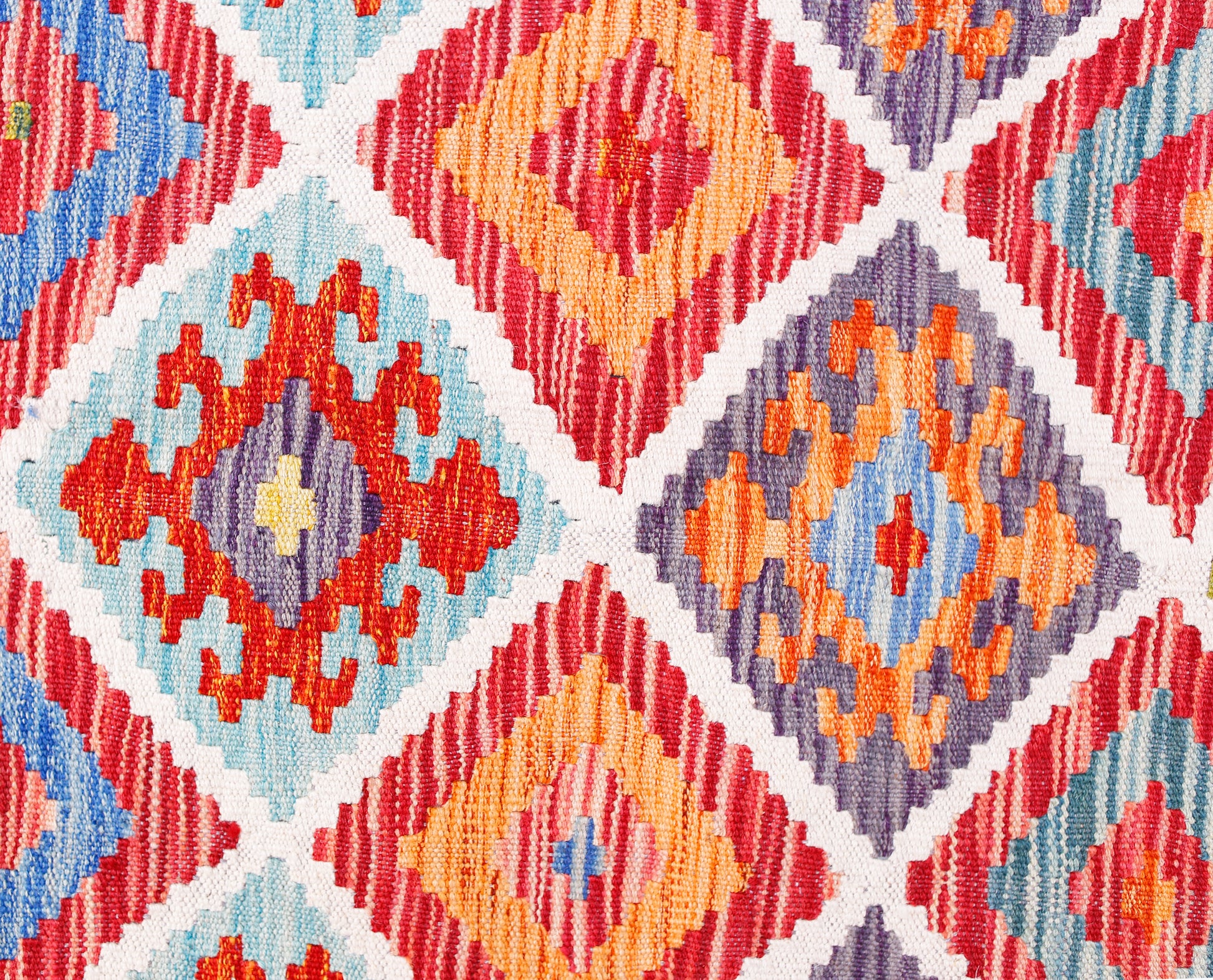 Handwoven Afghan Maimana kilim featuring a vibrant geometric diamond pattern in wool.